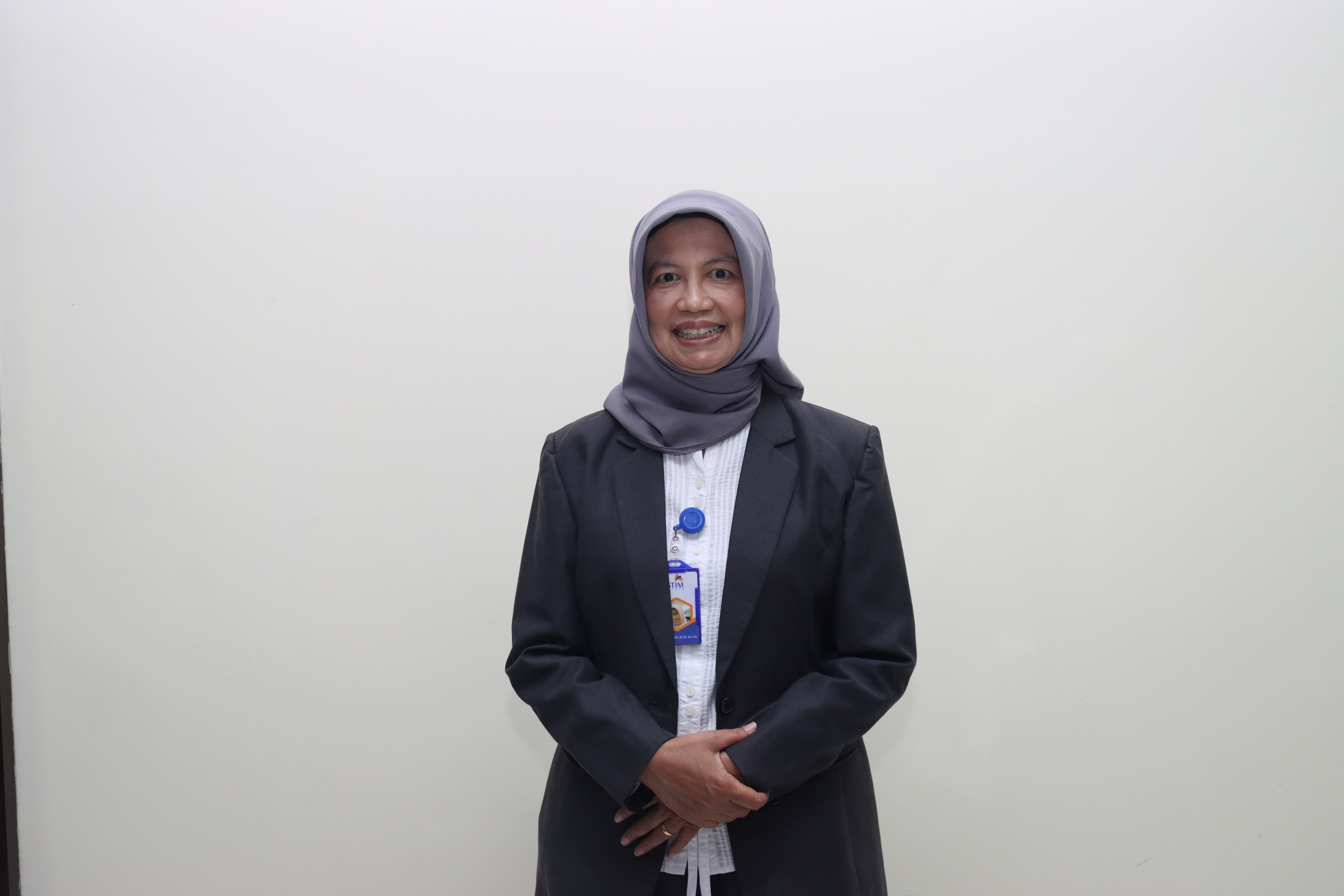 Siti Resmi, Dra., M.M., Ak., CA.